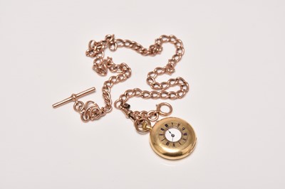 Lot 425 - An 18ct gold half hunter fob watch on 9ct gold Albert