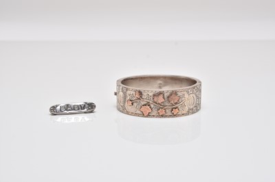 Lot 245 - A Victorian silver bangle and a silver brooch
