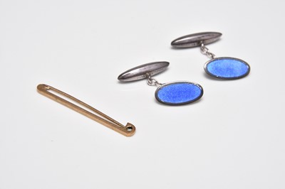 Lot 354 - A pair of silver and blue enamel cufflinks and a yellow metal bar brooch