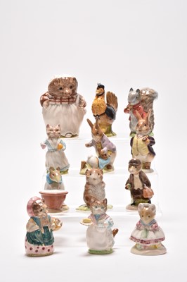 Lot 306 - A group of Beswick and Royal Albert Beatrix Potter figures