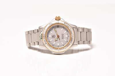 Lot 467 - Tag Heuer: A mid-size stainless steel 4000 bracelet watch