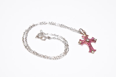 Lot 234 - A ruby and diamond cross pendant
