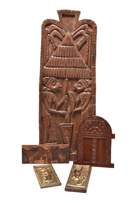 Lot 15 - An African Dogon tribal carved wood panel, Mali, and four other small panels