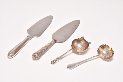 Lot 80 - A tea strainer spoon, sugar sifter spoon and two cake slices