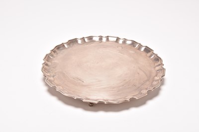 Lot 52 - A white metal salver