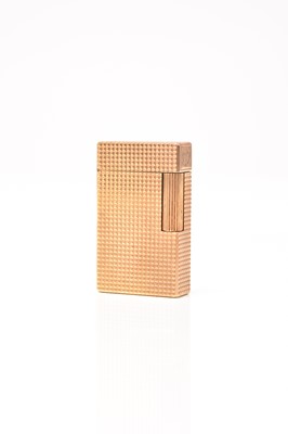 Lot 227 - S.T. Dupont: A cased gold plated cigarette lighter