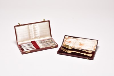 Lot 35 - A cased set of six silver lobster picks and a silver gilt spoon and fork