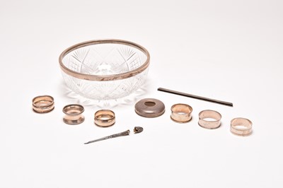 Lot 77 - A silver mounted cut glass bowl, silver napkin rings and a dressing table jar