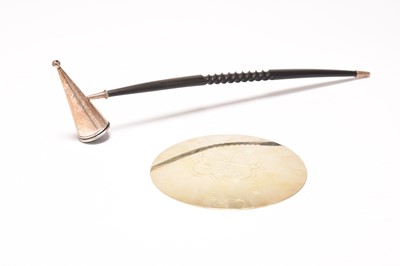Lot 47 - A silver candle snuffer and a gilt metal paten
