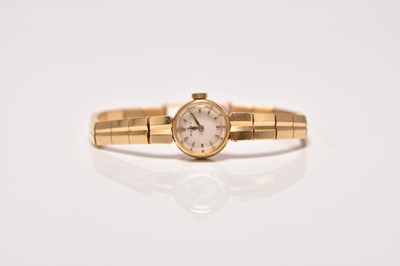 Lot 463 - Rolex: A lady's 18ct gold bracelet watch