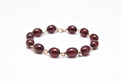 Lot 240 - An amber bead bracelet