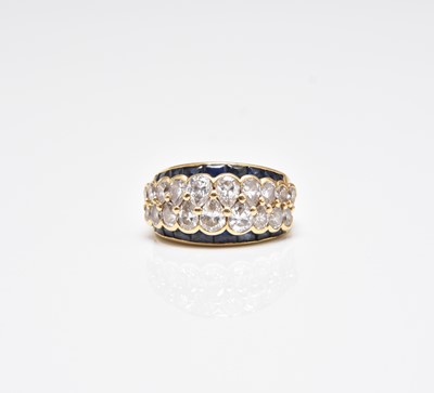 Lot 360 - A pear cut diamond and sapphire ring