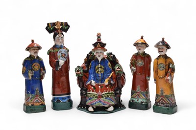 Lot 31 - A set of Chinese famille rose figures of an emperor, consort and attendants
