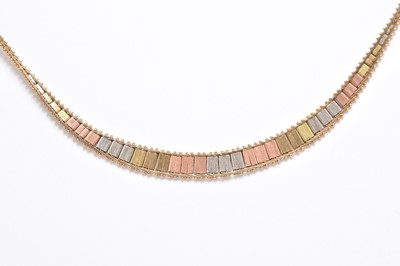 Lot 249 - A tri-coloured yellow, white and rose metal necklace