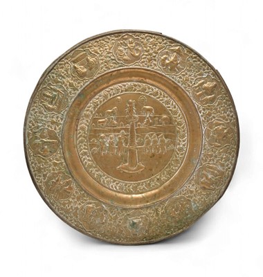 Lot 109 - A large Indian embossed brass table top