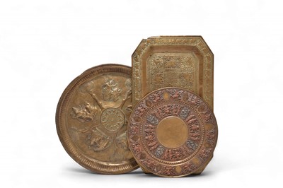Lot 111 - Three Indian embossed brass dishes or trays