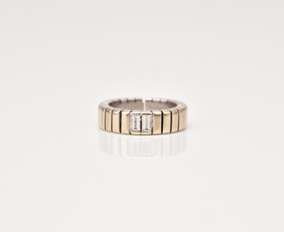 Lot 326 - An 18ct white gold diamond set band by De Beers