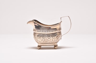 Lot 102 - A George III Irish silver cream jug