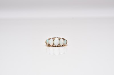 Lot 408 - A late 19th / early 20th century five stone opal ring
