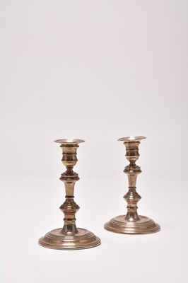 Lot 43 - A pair of silver mounted candlesticks