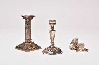 Lot 124 - Two silver mounted candlesticks