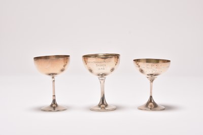 Lot 104 - Three small silver saucer goblets