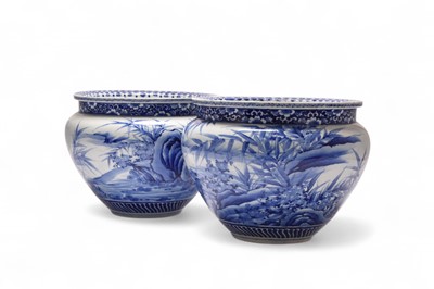 Lot 76 - A pair of Japanese Arita blue and white jardinieres