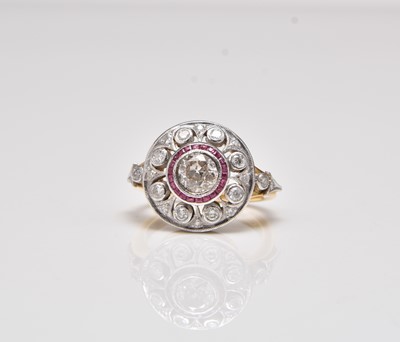 Lot 356 - An 18ct gold Art Deco style diamond and ruby ring