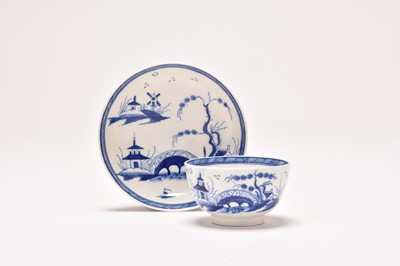 Lot 20 - Uncommon Caughley 'Bridge and Windmill' tea bowl and saucer, circa 1783-93