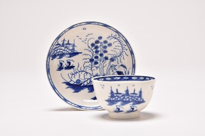 Lot 23 - Uncommon Caughley 'Rock Strata Island' tea bowl and saucer, circa 1776-90