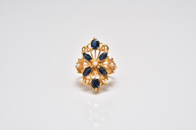 Lot 322 - A sapphire and seed pearl ring