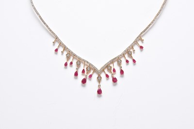 Lot 375 - A ruby and diamond fringe necklace