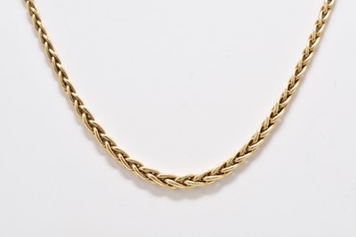 Lot 263 - A yellow metal graduated Wheat link chain necklace