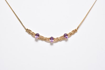 Lot 294 - A 9ct gold amethyst and diamond necklace