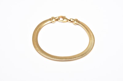 Lot 361 - A yellow metal snake link bracelet