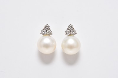 Lot 279 - A pair of diamond and cultured pearl earrings
