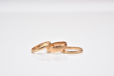 Lot 244 - Three gold wedding bands