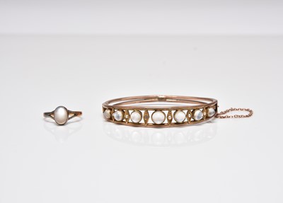 Lot 277 - A moonstone bangle and a moonstone ring