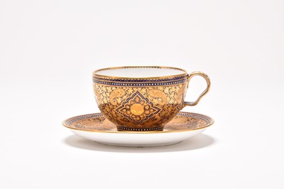 Lot A Coalport gilt and blue teacup and saucer, circa 1880