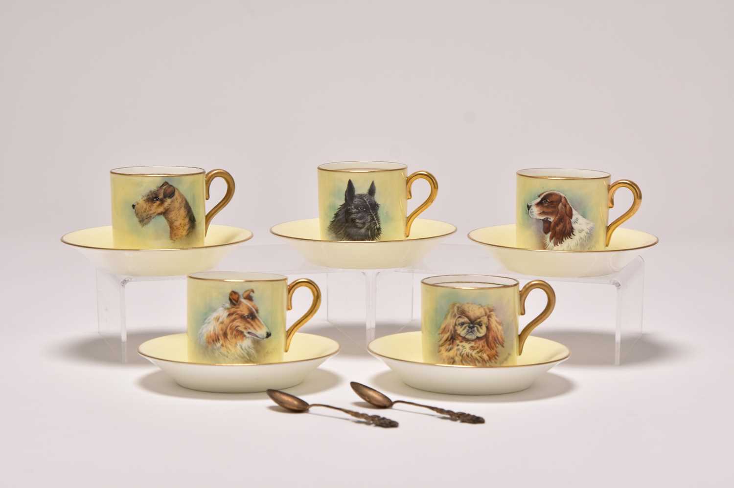 Lot 213 - A set of Coalport coffee cans and saucers,