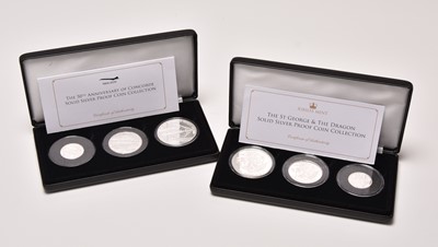 Lot 209 - Two coin sets