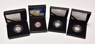 Lot 210 - A collection of four proof silver fifty pence coins