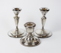 Lot 3 - A pair of silver mounted candlesticks, James...