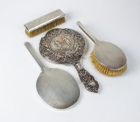 Lot 11 - A silver mounted hand mirror, Birmingham 1904,...