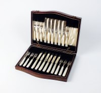 Lot 16 - A part cased set of silver fruit knives and...