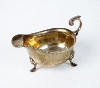 Lot 24 - A silver sauce boat, Harrison Brothers &...