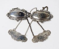 Lot 29 - A pair of Victorian silver decanter labels,...