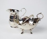 Lot 34 - A plain polished silver baluster cream jug,...