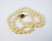 Lot 58 - A uniform cultured pearl necklace, with...