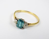 Lot 64 - A three stone zircon and diamond ring, weight...